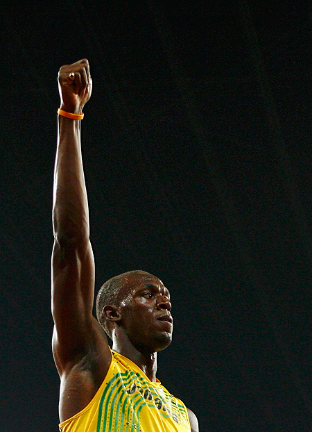  Usain Bolt of Jamaica gestures after his team won their men's 4 x 100m relay final of the athletics competition in the National Stadium at the Beijing 2008 Olympic Games August 22, 2008